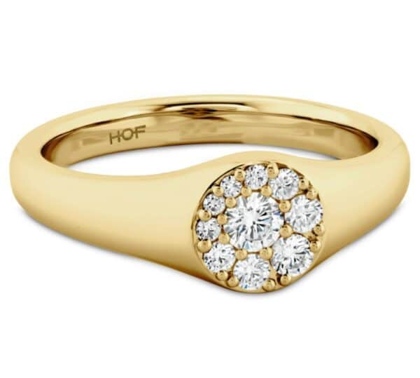 A yellow gold ring with diamonds in the center.