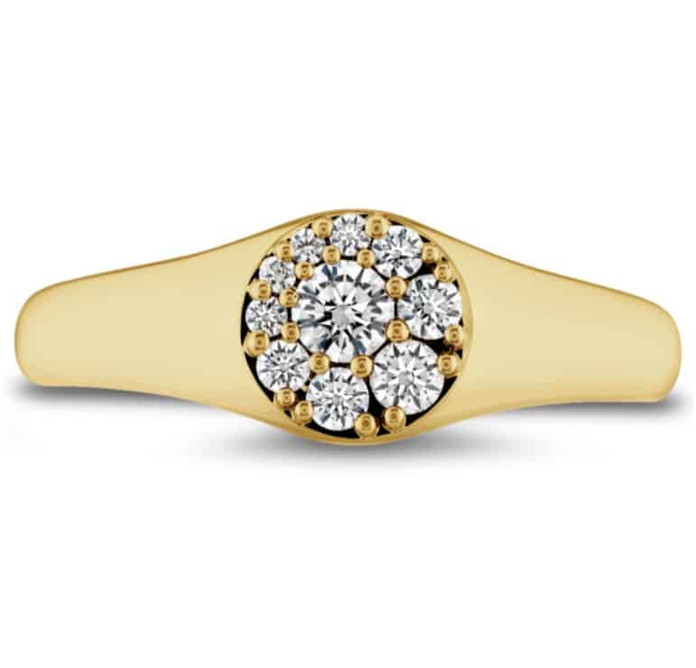 A yellow gold ring with a cluster of diamonds.