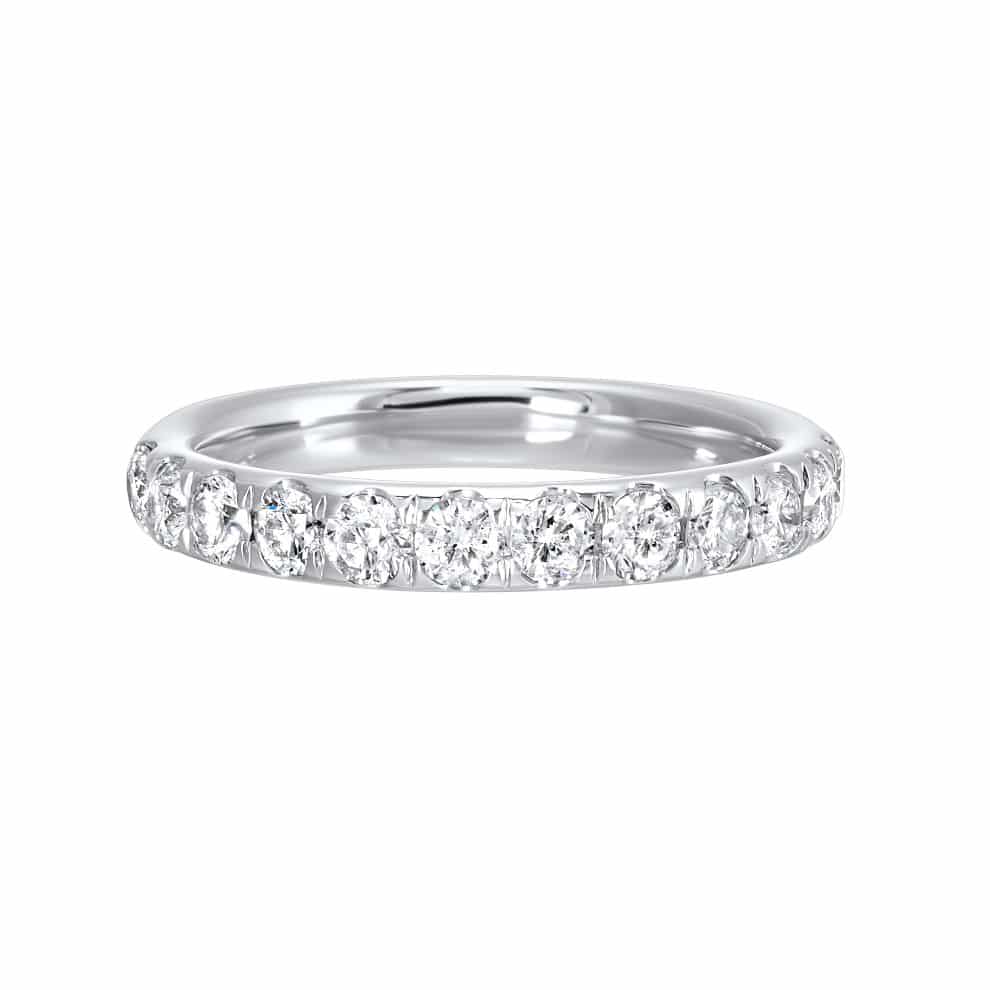 A white gold eternity band with round diamonds.