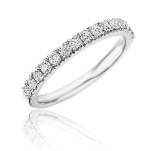 A white gold wedding band with round diamonds.