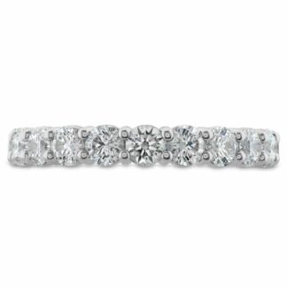 A white gold diamond band with round stones.