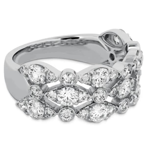 A white gold ring with a cluster of diamonds.