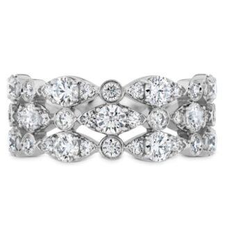 A white gold diamond ring with three rows of diamonds.