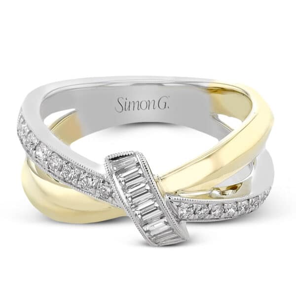 Simon's diamond ring in yellow gold and white gold.