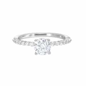 A white gold engagement ring with a round brilliant cut diamond.