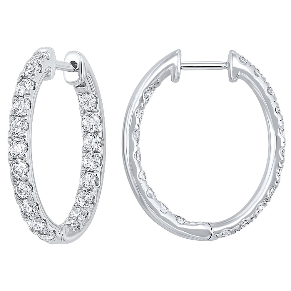 A pair of white gold hoop earrings with diamonds.