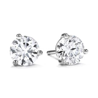 A pair of diamond stud earrings in white gold.