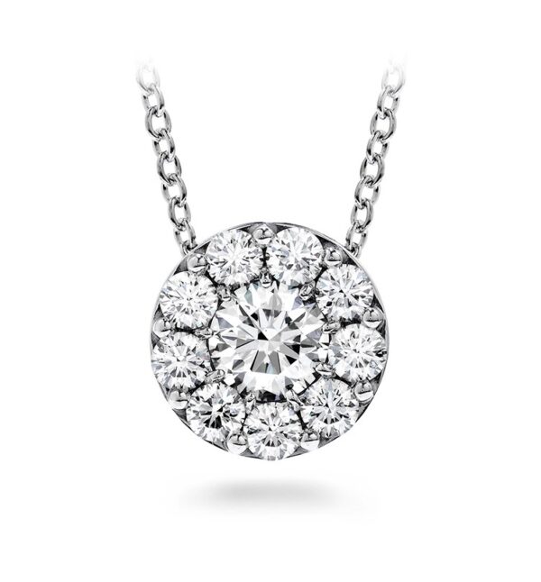 A diamond halo pendant on a chain.