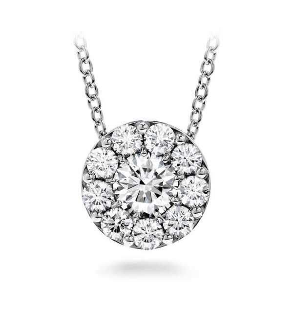 A diamond halo pendant on a chain.