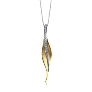 A gold and diamond leaf pendant on a chain.