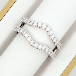 A white gold diamond ring in a box.