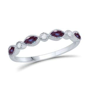 A purple sapphire and diamond band ring.
