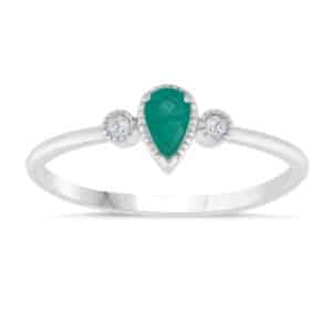 An emerald and diamond ring.