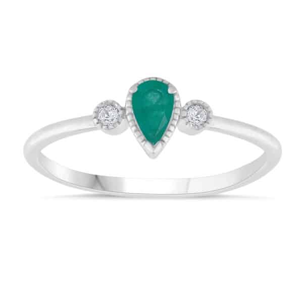 An emerald and diamond ring.