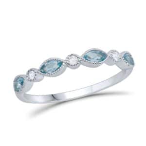 A sterling silver ring with blue topaz and diamonds.