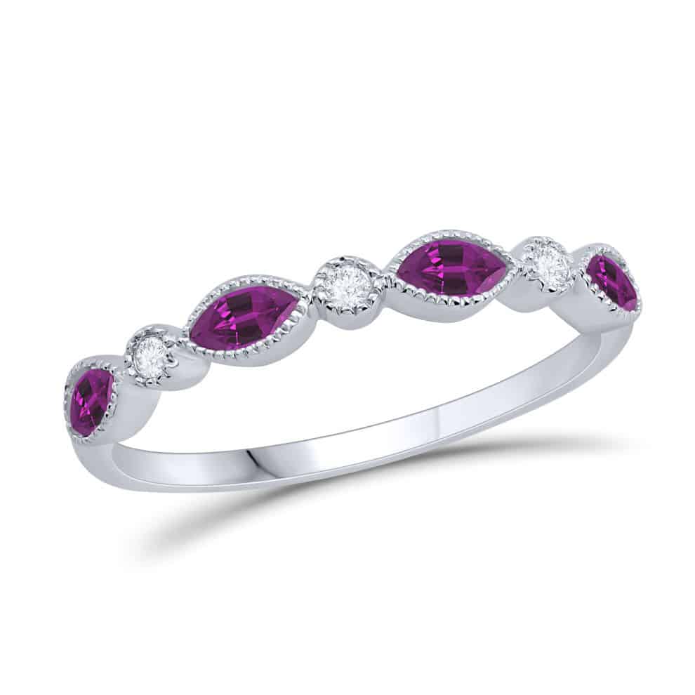 A pink sapphire and diamond band ring.