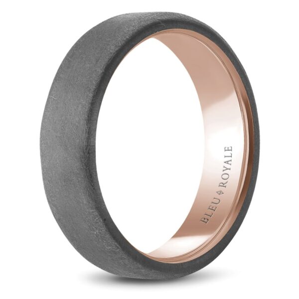 A men's wedding band with a rose gold inlay.
