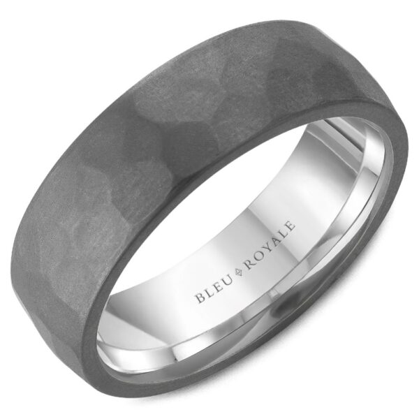 A black wedding band with a hammered finish.