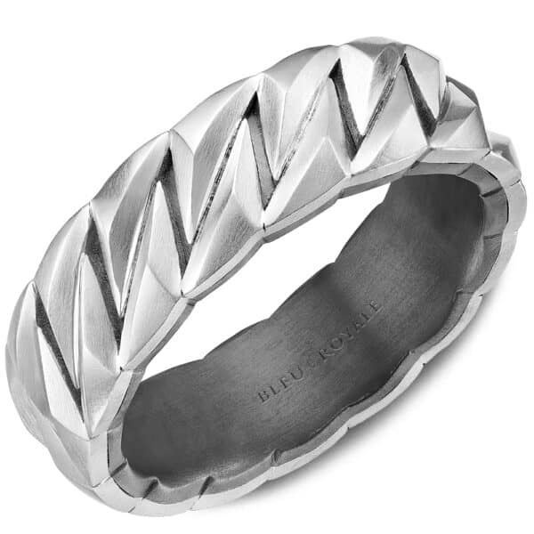 A men's wedding band with an intricate design.