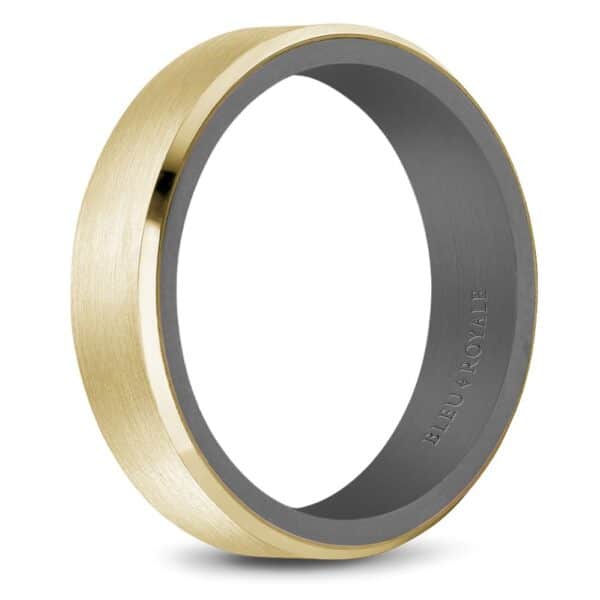 A men's wedding band in yellow gold with a grey finish.