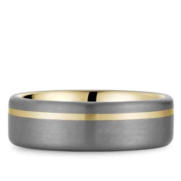 A men's wedding band with a yellow gold stripe.