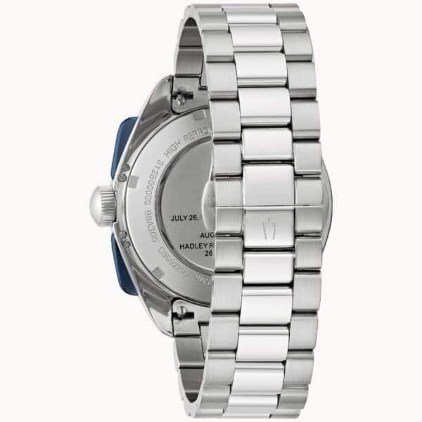 A stainless steel watch with a blue dial.
