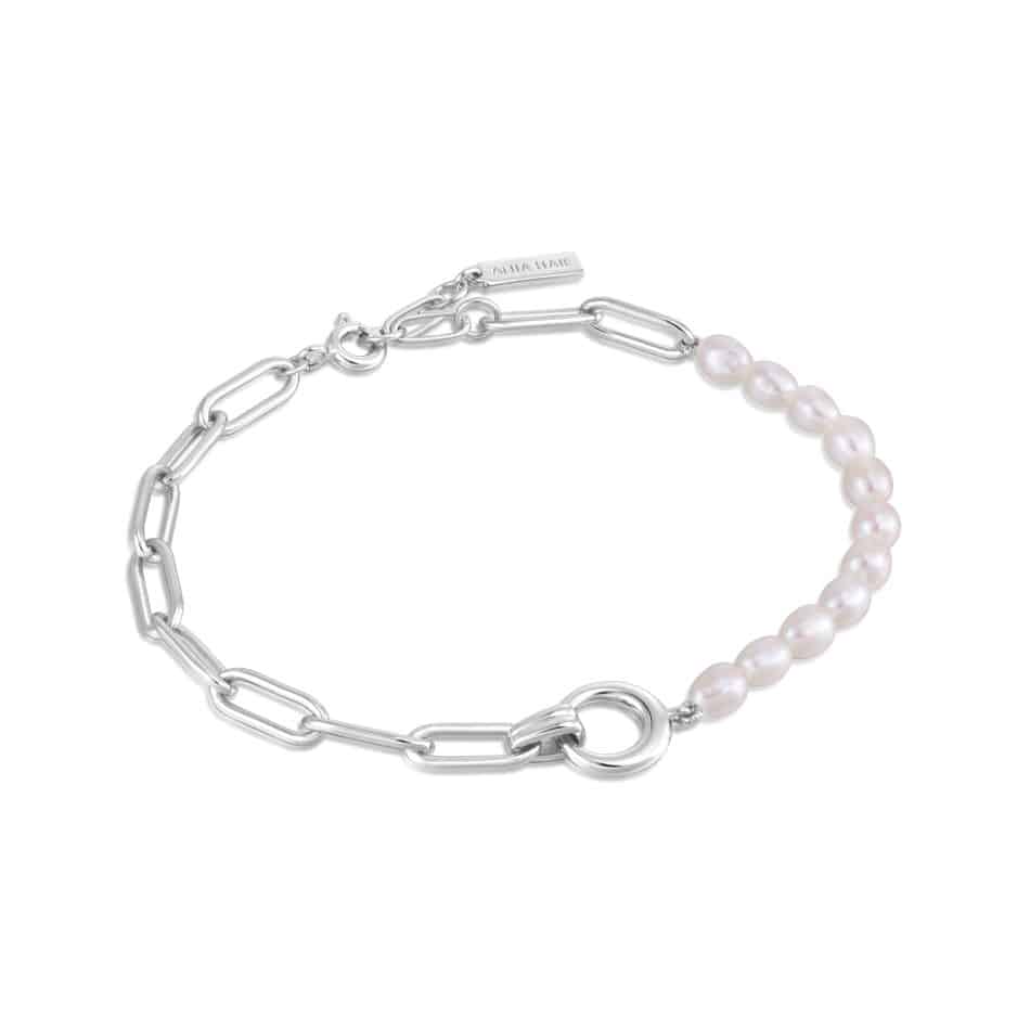 A white pearl bracelet with a silver chain.