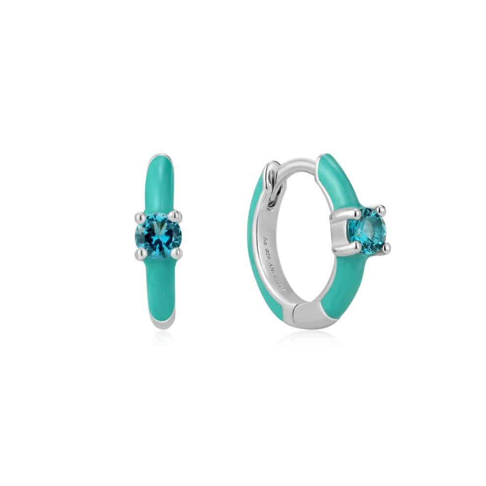 A pair of turquoise hoop earrings in sterling silver.