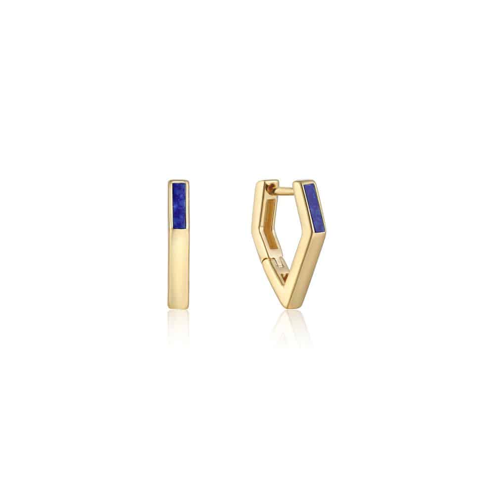 A pair of gold hoop earrings with lapis lazuli stones.