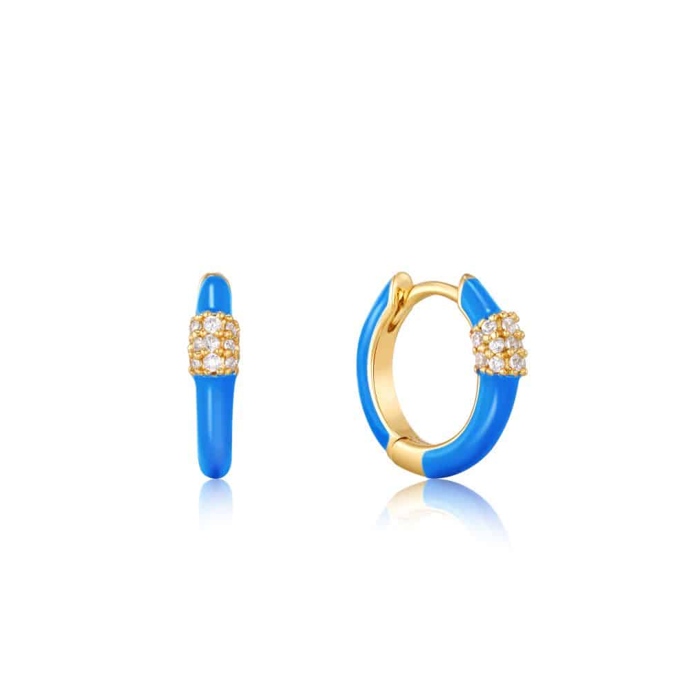 A pair of blue enamel hoop earrings with diamonds.