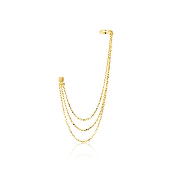 A gold chain ear cuff on a white background.