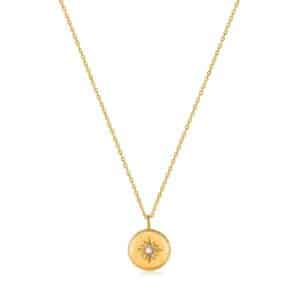 A yellow gold necklace with a star shaped pendant.