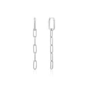A pair of silver chain earrings on a white background.