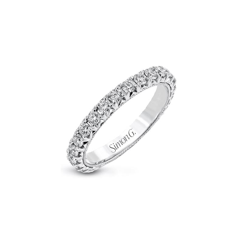 A white gold wedding band with pave set diamonds.