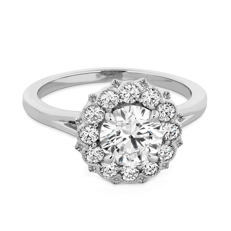 A diamond halo engagement ring in white gold.