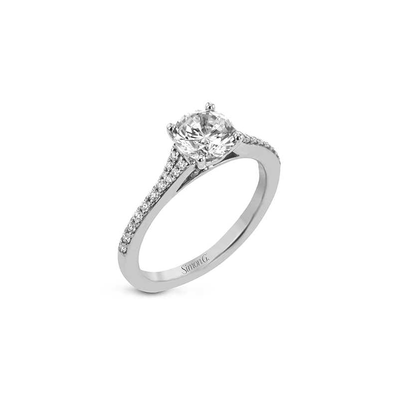 A white gold engagement ring with diamonds.