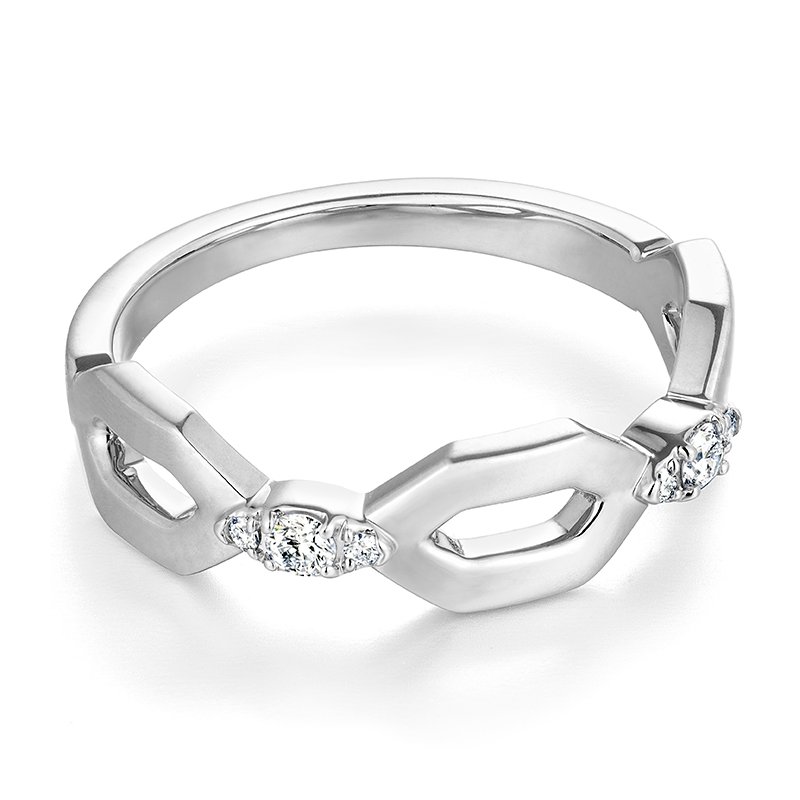 A white gold ring with three diamonds.