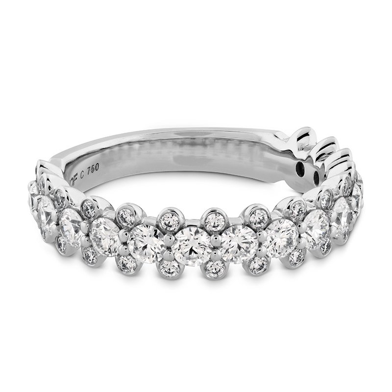 A white gold band with diamonds in the center.