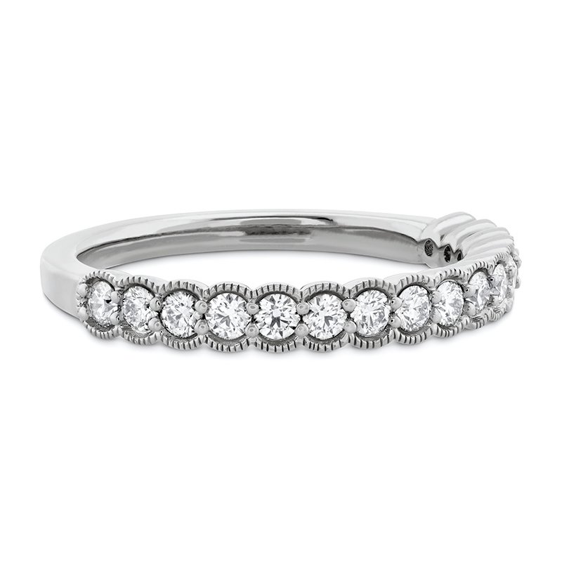 A white gold band with diamonds in the center.